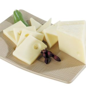 Swiss Cheese on Tan Plate with Garnish Food Picture