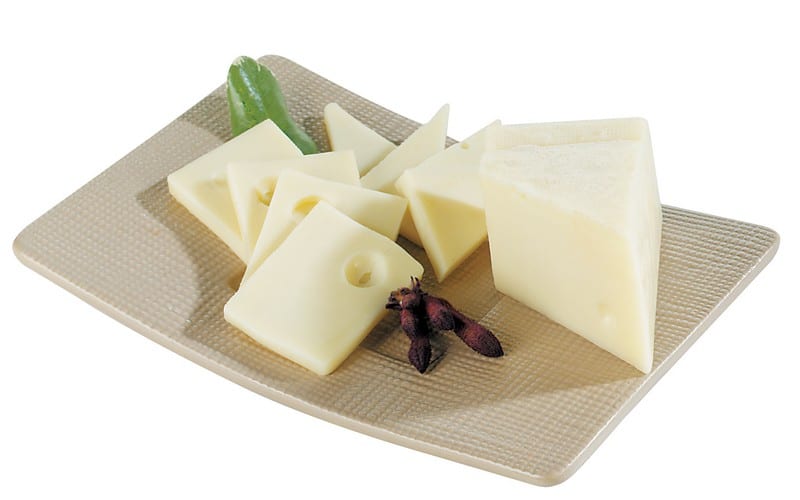 Swiss Cheese on Tan Plate with Garnish Food Picture