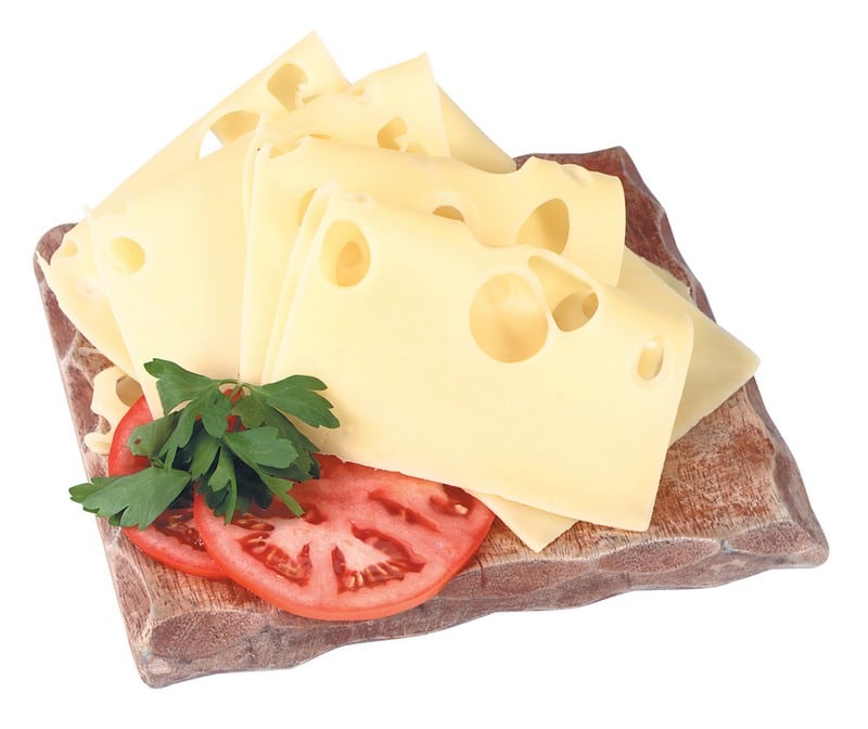 Swiss Cheese with Garnish on Stone Slab Food Picture