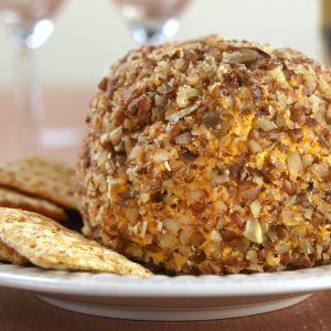 Cheese Ball and Cracker Spread on White Plate Food Picture
