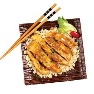 Asian Chicken over Rice with Wooden Chopsticks Food Picture