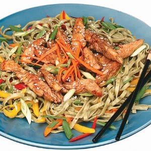 Chicken Stir Fry with Chopsticks on Blue Plate Food Picture