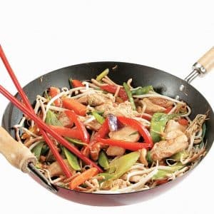 Chicken Stir Fry with Chopsticks in Skillet Food Picture