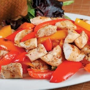 Chicken and Pepper Stir Fry on White Plate Food Picture