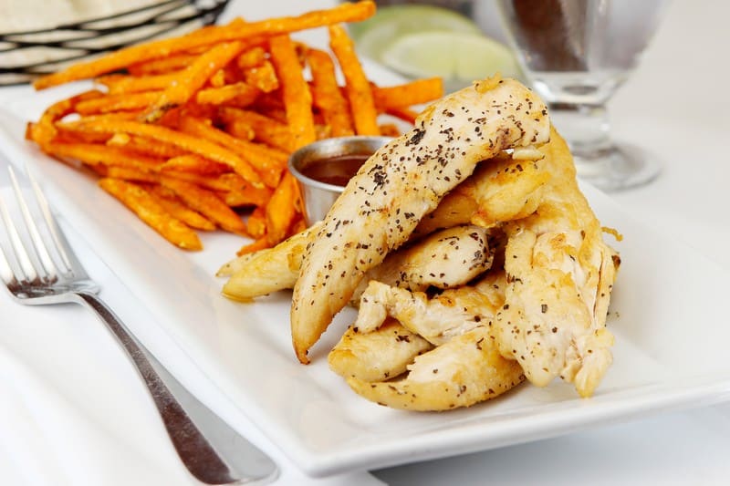 Seasoned Grilled Chicken Tenders with Crispy Sweet Potato Shoe String Fries and Dipping Sauce Food Picture