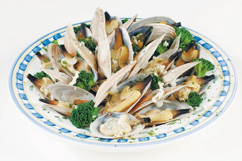 Steamed Clams With Broccoli On Multi-Colored Plate Food Picture