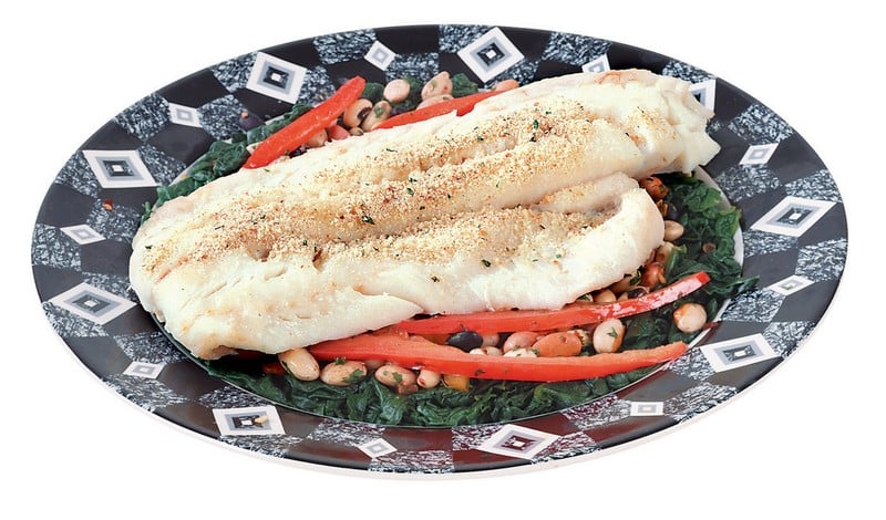 Cod Fillet over Vegetables on Black and White Plate Food Picture
