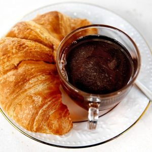 Black Cup of Coffee with Freshly Made Croissant Food Picture