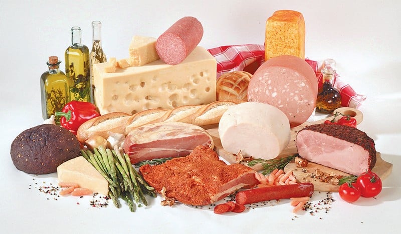 Cold Cut Assortment with Garnish and Veggies and Oil Food Picture