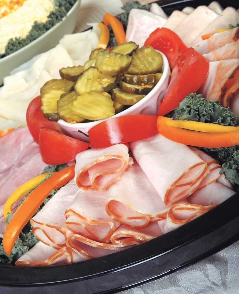 Cold Cut Assortment on Black Tray with Pickles Food Picture