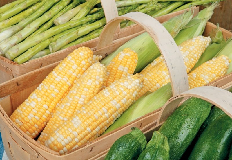 Corn on the cob, asparagus, and zucchini in wooden baskets Food Picture