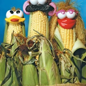 Corn on the cob with eyes and mouths Food Picture