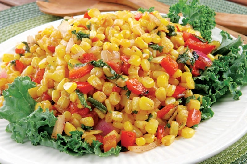 Corn salsa on white plate with garnish Food Picture