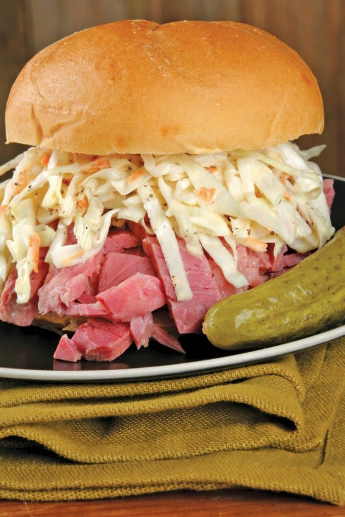 Corned Beef Sandwich with Coleslaw on Black Plate Food Picture