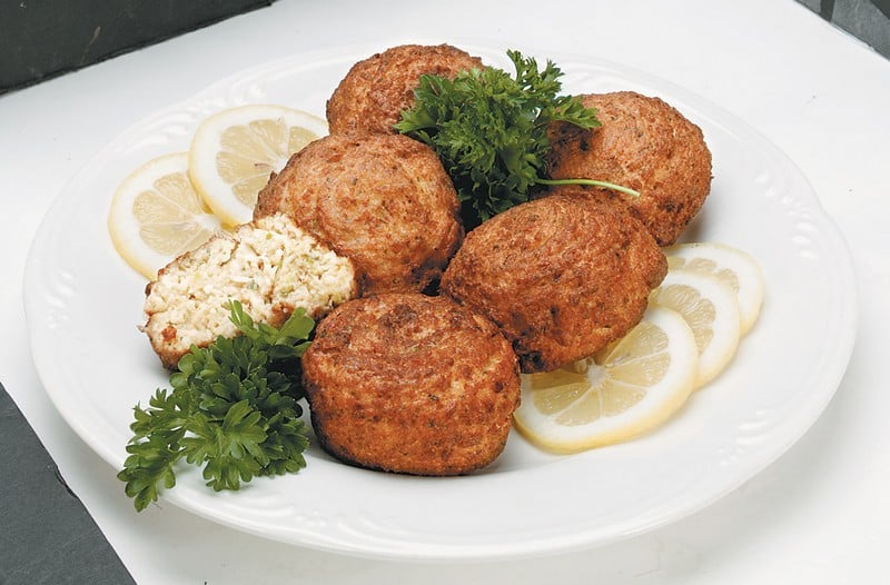 Crab Cakes on White Plate with Lemon Slices Food Picture