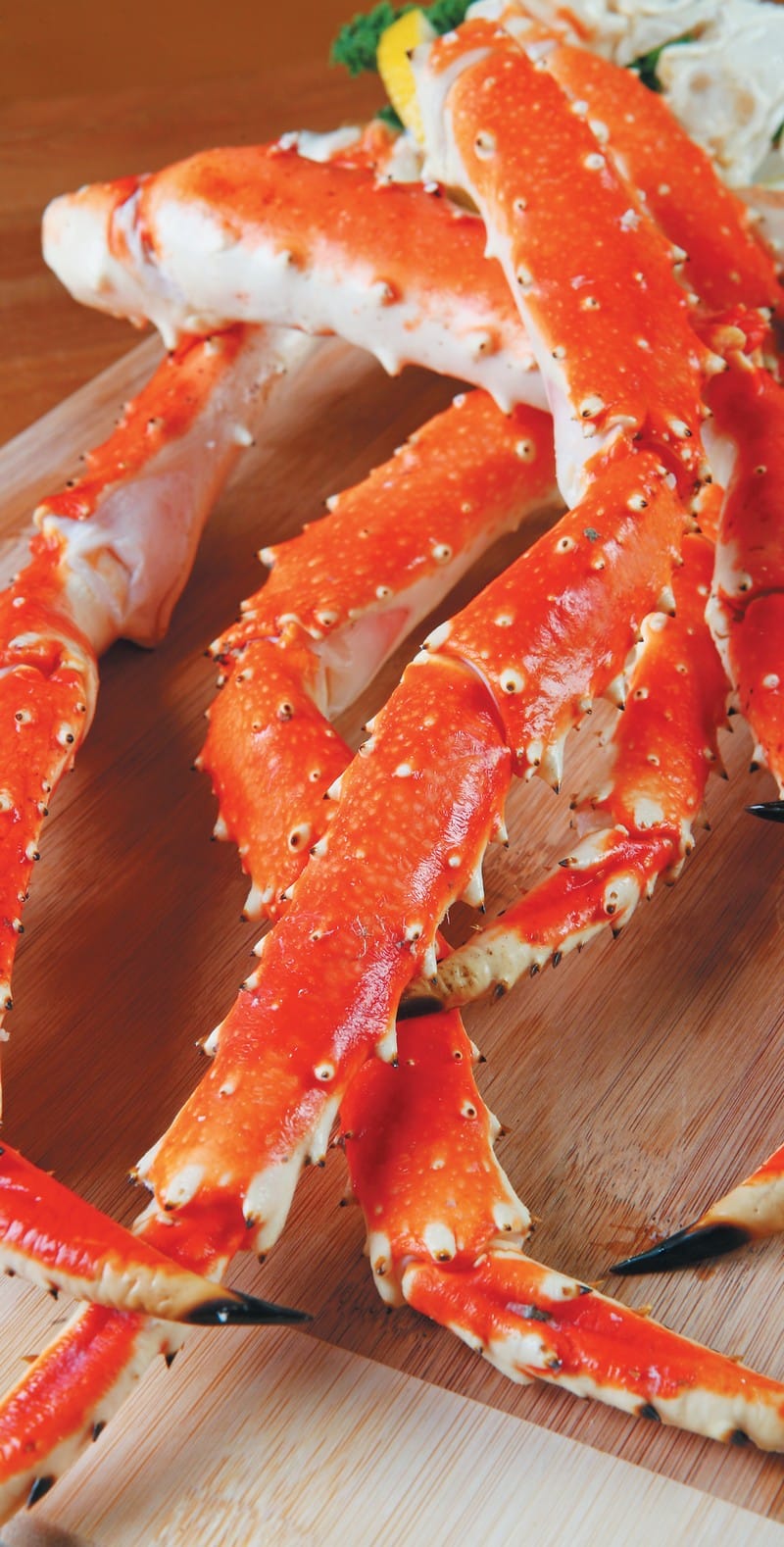 Crab Leg on Wooden Surface Food Picture