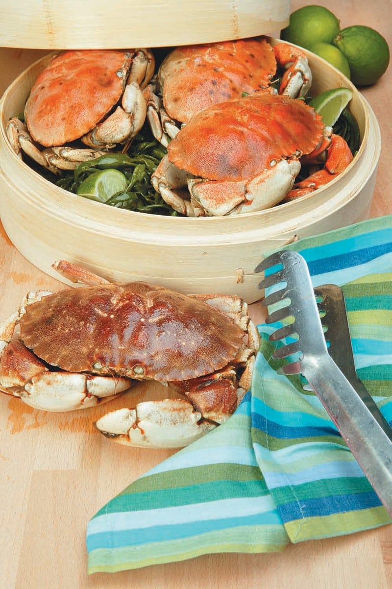 Crabs in a Wooden Bowl with Tongues and a Cloth Food Picture