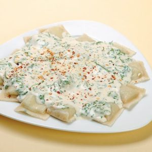 Cream Spinach Ravioli on a Plate Food Picture