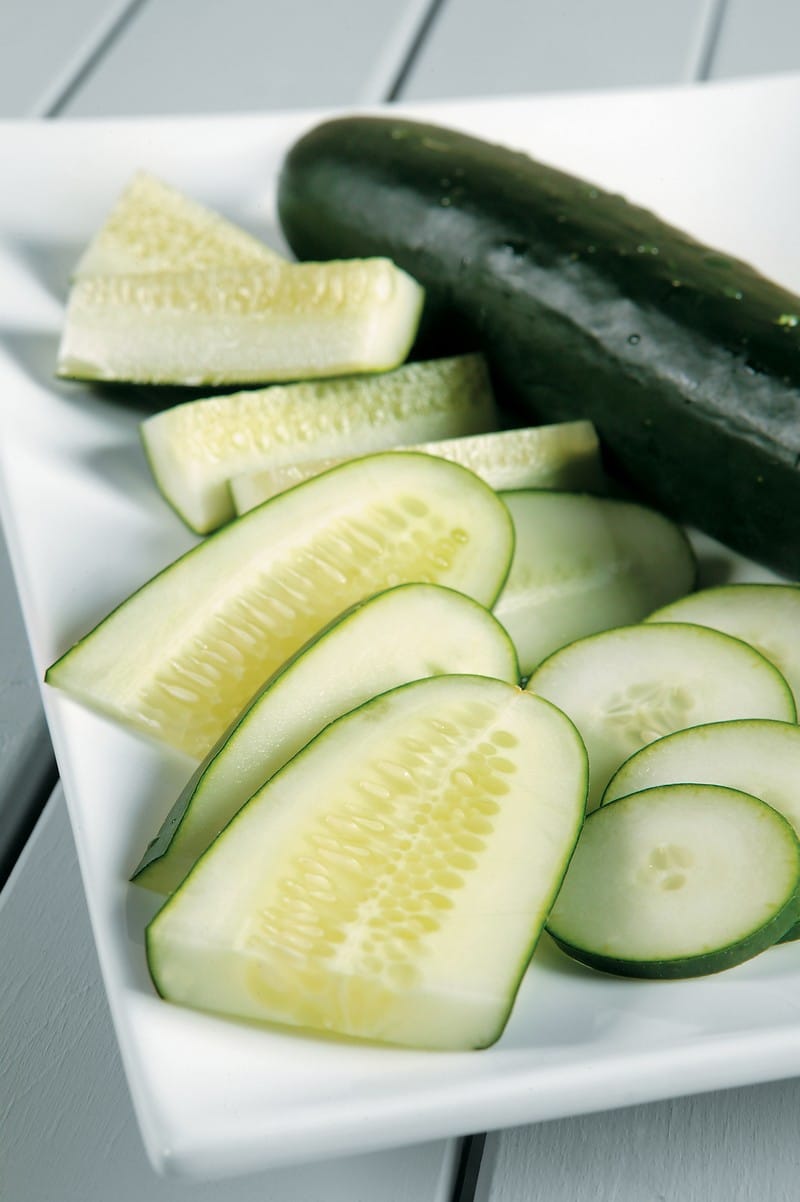 Whole and Sliced Cucumber on Plate Food Picture