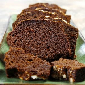 Unfrosted Devil's Food Cake Slices with Walnut Pieces on Green Platter Food Picture