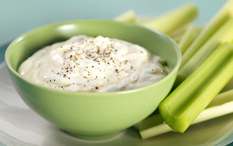 Bowl of Vegetable Dip with Celery Sticks Food Picture