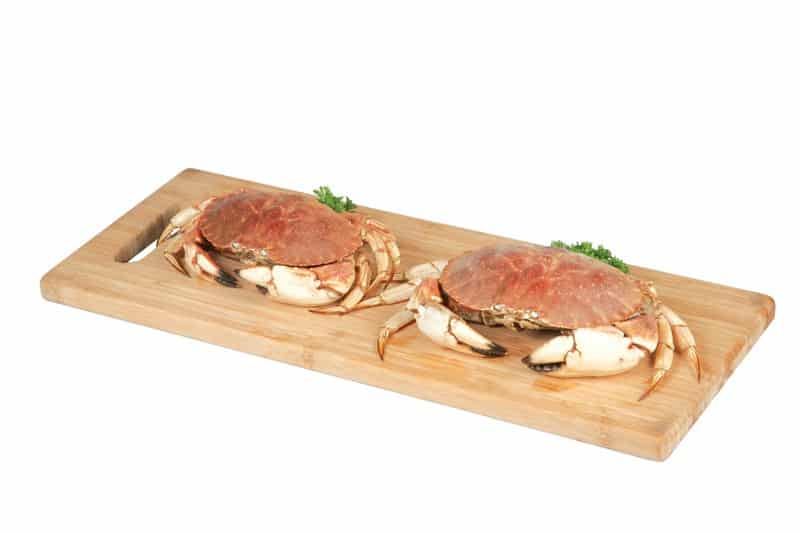 Dungeness Crabs on Wooden Cutting Board Food Picture