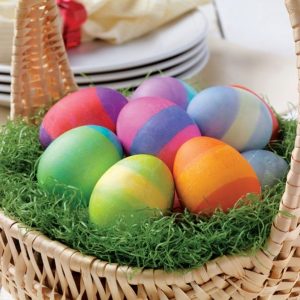 Colored Easter Egg Assortments over Green Grass in Basket Food Picture