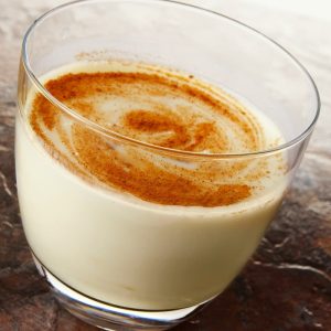 Fresh Glass of Egg Nog with Cinammon Swirl Food Picture