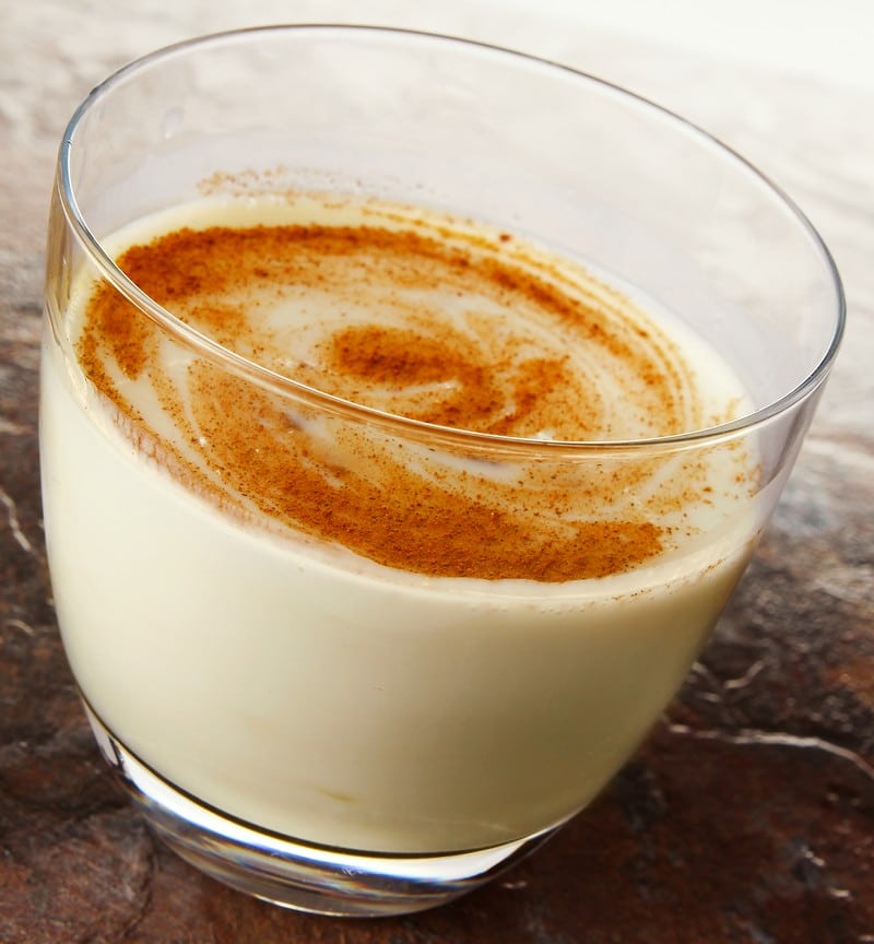 Fresh Glass of Egg Nog with Cinammon Swirl Food Picture