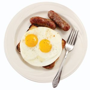 Sunny Up Eggs on Toast with Sausage Food Picture