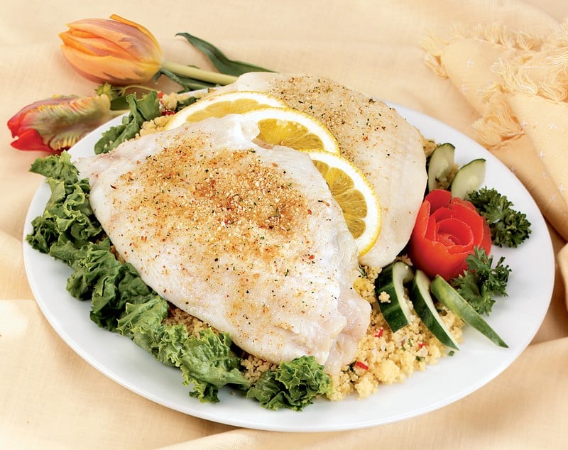 Flounder Fillet over Rice and Veggies on White Plate Food Picture