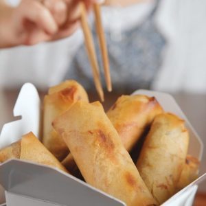 Girl Reaching For Spring Rolls Food Picture