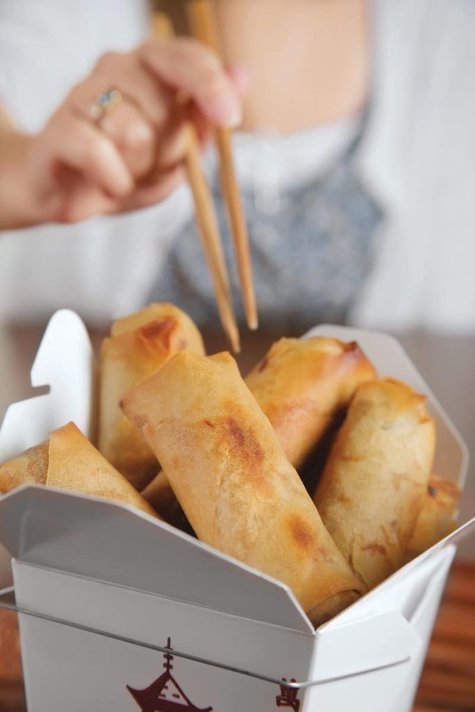 Girl Reaching For Spring Rolls Food Picture