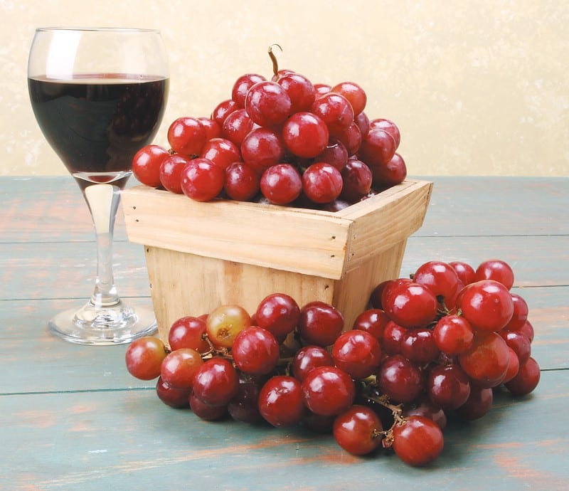 Box of Red Grapes with Wine Food Picture