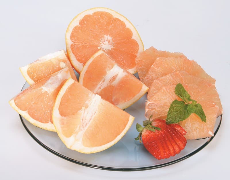 Cut Grapefruits and Strawberry on Glass Plate Food Picture