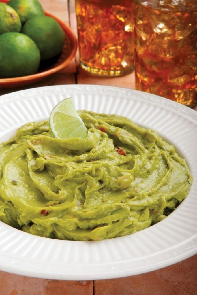 Bowl of Fresh Guacamole with Lime Food Picture