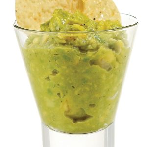 Guacamole with Chips in Clear Tall Dish Food Picture