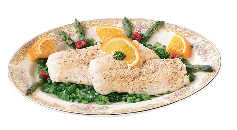 Haddock Fillet over Asparagus with Oranges on Plate Food Picture