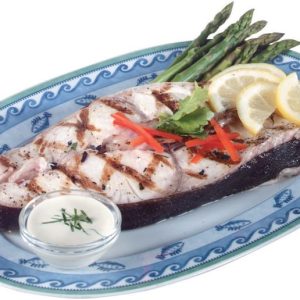 Whole Cooked Halibut on Plate with Lemon and Asparagus Food Picture