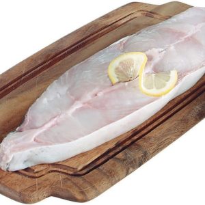 Whole Raw Halibut on Wooden Board and Lemon Slices Food Picture