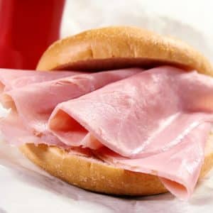 Deli-Style Thick Sliced Ham Sandwich on a New England Bulkie Roll in Wax Paper Food Picture