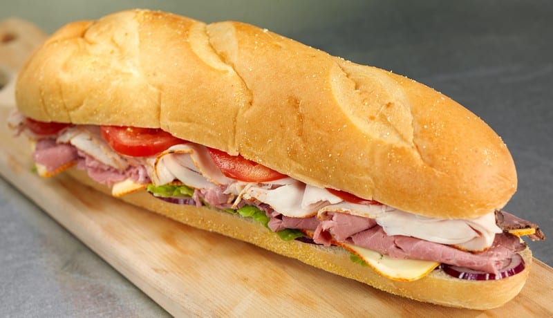 Fresh Hoagie Deli Sandwich on Cutting Board Food Picture