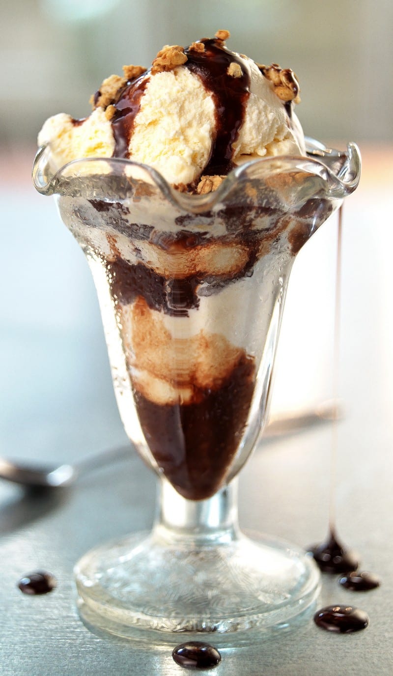Hot Fudge Sundae with Vanilla Ice Cream and Nut Topping Food Picture