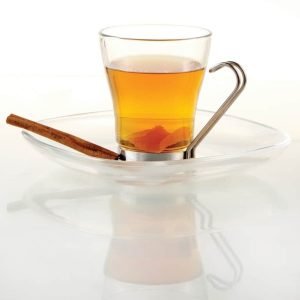 A Glass of Hot Toddy on a Plate with Cinnamon Food Picture