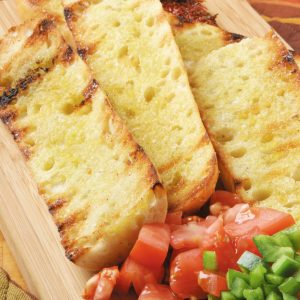 Italian Bread Buttered on Board Food Picture