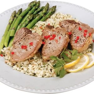 Lamb Chop on a Plate with Lemon Slices and Rice Food Picture