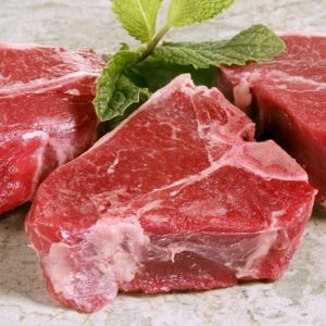 Fresh Boneless Raw Lamb Chops with Mint Garnish Food Picture