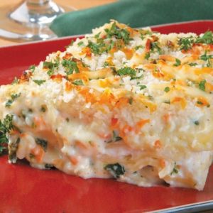 Vegetable Lasagna in Red Plate with Garnish Food Picture