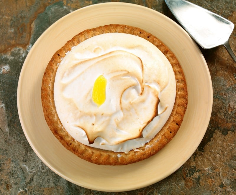 Mini Homemade Fresh Baked Lemon Meringue Pie on Slate Countertop Food Picture