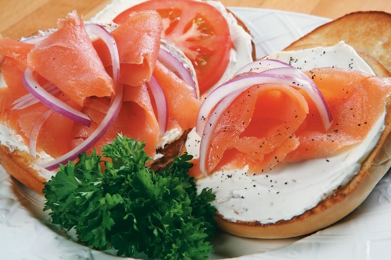Lox Bagel with Garnish on White Plate Food Picture